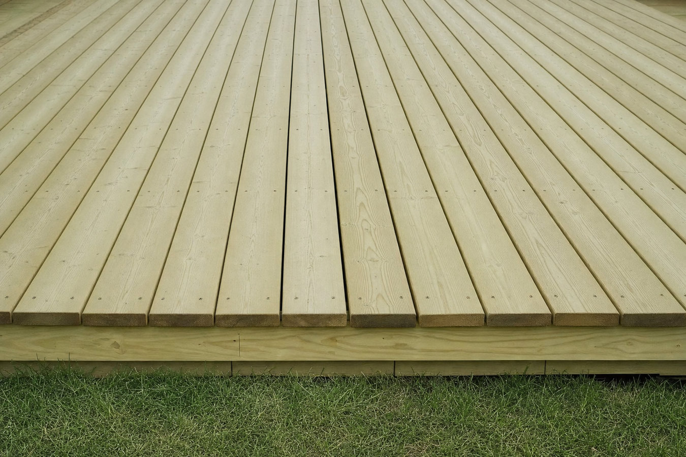 Pressure-treated wood deck construction